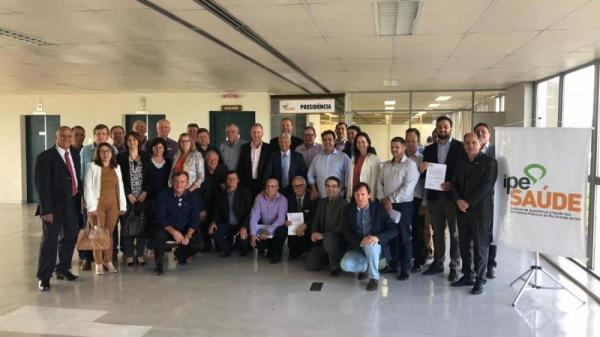 Ato de assinatura do Termo Aditivo (Foto: Divulgação/IPE Saúde)